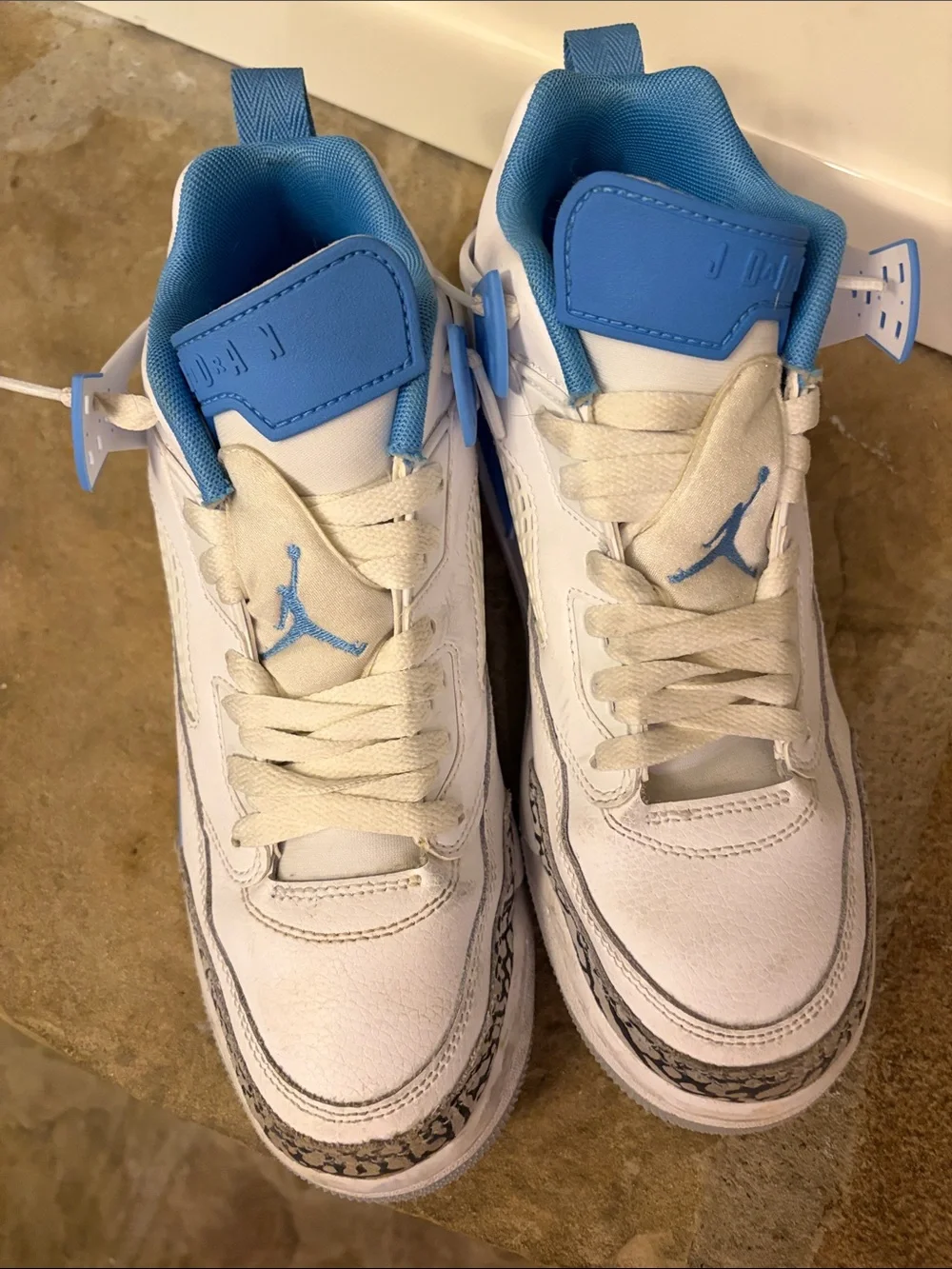 Nike Kids White and University Blue Jordan Retro Sneakers